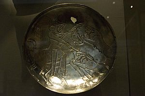 Sassanid silver plate depicting a lion hunt by Nickmard Khoey