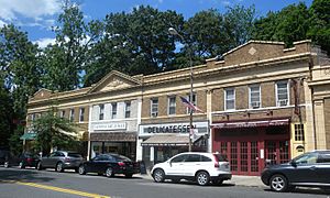 A block of shops on Douglaston Parkway; the National Art League occupies part of this block
