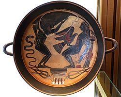 Prometheus and Atlas, Laconian black-figure kylix, by the Arkesilas Painter, 560-550 BC, inv. 16592 - Museo Gregoriano Etrusco - Vatican Museums - DSC01069.jpg