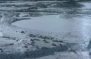 Aerial view of Arctic Village in wintertime.