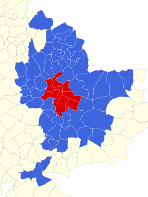 The city (commune) of Lyon (in red) and 58 suburban communes (in blue) make up the Metropolitan region.