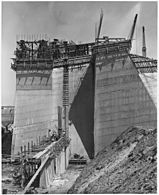 Looking east along the axis of the dam at a section of the spillway structure showing the cut-off wall between the... - NARA - 295309