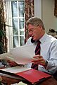 President Bill Clinton talks on the telephone regarding Kosovo in the Oval Office Dining Room