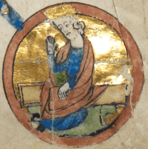 A circular medieval miniature, showing a man in blue robes, with long flowing hair and a short beard.