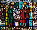Stained glass window depicting Episcopal baptism