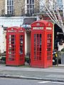 Big and small red phonebox