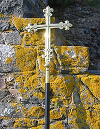 Cross with lichen at Hermitage St Helier Jersey