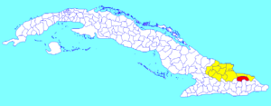 Sagua de Tánamo municipality (red) within  Holguín Province (yellow) and Cuba