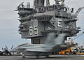 US Navy 100512-N-8446A-004 An F-A-18F Super Hornet assigned to the Fighting Checkmates of Strike Fighter Squadron (VFA) 211 lands aboard the aircraft carrier USS Enterprise (CVN 65)