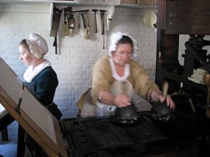Lady working colonial print shop