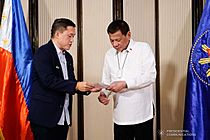 President Rodrigo Roa Duterte strikes his signature pose with the Filipino athletes who have brought home medals from various international competitions during their meeting at the Malago Clubhouse in Malacañang on October 16, 2019. 3