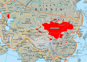 Topographic map showing Asia as centered on modern-day Mongolia and Kazakhstan. An orange line shows the extent of the Mongol Empire. Some places are filled in red. This includes all of Mongolia, most of Inner Mongolia and Kalmykia, three enclaves in Xinjiang, multiple tiny enclaves round Lake Baikal, part of Manchuria, Gansu, Qinghai, and one place that is west of Nanjing and in the south-south-west of Zhengzhou