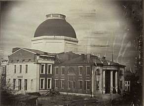 St. Louis Courthouse (Old Courthouse) showing unfinished portion of new building and earlier courthouse still remaining