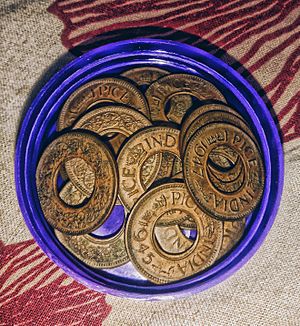 A lot of 1 pice coins from British India, from a personal collection in West Bengal, photographed by Yogabrata Chakraborty, on August 12, 2023