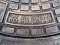 New manhole cover with the name of the Belarusian city of Grodno in Chinese, 格罗德诺, City Center, Saviecka St, 20 June 2018