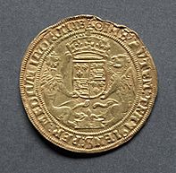 Gold coin showing a heraldic shield
