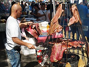Hanging Meat at a Street Fair 2