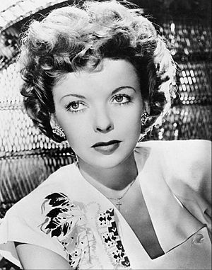 A headshot of Lupino looking up away from the camera
