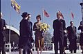 Princess Elizabeth holding flowers on stage with Prince Philip and several people. Royal Visit 1951, Ontario (2)