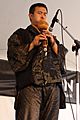 Wang Li playing an hulusi (calabash flute) - 2012 Richmond Folk Festival