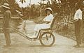 Female missionary in rickshaw Congo circa 1920-1930