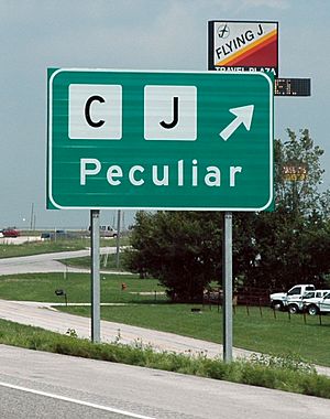 Sign directing travelers to Peculiar
