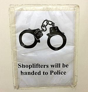 Shoplifting sign cuffs1