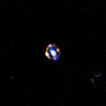 The most distant gravitational lens yet discovered