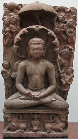 Statue of a cross-legged Parshvanatha