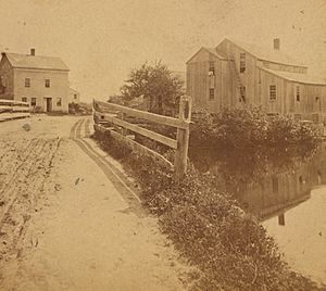 View of road next to body of water at Hopkinton, from Robert N. Dennis collection of stereoscopic views