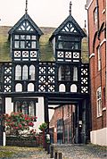 a timber gate house of the tudor period
