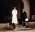 Aeneas Francon Williams (right, holding a hat) standing on the steps of Wolseley House, Kalimpong 1914