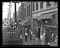Crowds gather in 700-block North Alameda street after police raids in Los Angeles, Calif., 1938