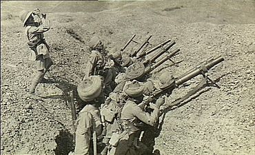Indian Army troops in Mesopotamia prepare to fire against enemy aircraft, c. 1918