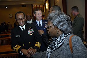 US Navy 090212-M-2311L-085 Vice Adm. Mel Williams shakes hands with Retired Rear Adm. Lillian Fishburne, the Navy's first female African American flag officer