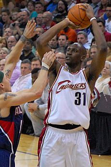 Jawad Williams shooting over Mike Bibby cropped