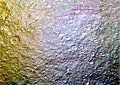 PIA19637-SaturnMoon-Tethys-RedArcs-Cassini-20150411
