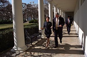 President Bill Clinton walks and talks with Director of the Office of Public Liaison, Alexis Herman