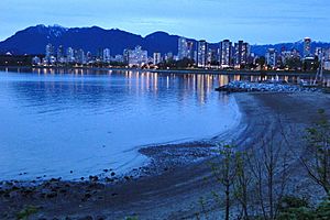 Dusk View of Downtown and West End from Kitsilano Beach - Vancouver BC - Canada