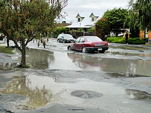 Sink holes and liquefaction on roads - Avonside in Christchurch