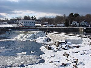 Looking across the falls at downtown Anson, showing the town hall at left, January 2010