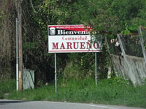 Sign marking the entrance to the main urban community in Barrio Marueño