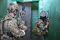 Philippines Soldiers and Australian Special Forces Soldier, clear a room during close quarters battle training in support of Balikatan 2017 at Fort Magsay in Santa Rosa, Nueva Ecija, May 12, 2017