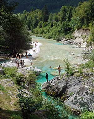 Swimming and sunbathing, Soča River near Soča and Lepena, Slovenia, 2013