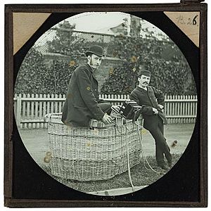 Cecil Shadbolt collection - 23 - Cecil Shadbolt (left) and 'Captain' William Dale (right) posed in the basket of a gas balloon. Shadbolt's camera can be seen, attached to the side of the basket.jpg