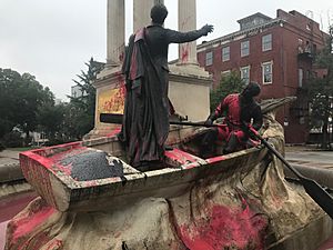 Statue marked with spray paint graffiti and splashed red paint, Francis Scott Key Monument (1911, Marius Jean Antonin Mercié), W. Lafayette Avenue and Eutaw Place, Baltimore, MD 21217 (37035175462)