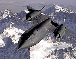 Dryden's SR-71B Blackbird, NASA 831, slices across the snow-covered southern Sierra Nevada Mountains of California after being refueled by an Air Force tanker during a 1994 flight. SR-71B was the trainer version of the SR-71. The dual cockpit to allow the instructor to fly.