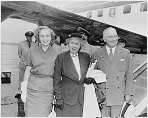 Photograph of President Truman, Mrs. Truman, and Margaret Truman at the airport in Washington, preparing to depart on... - NARA - 200331