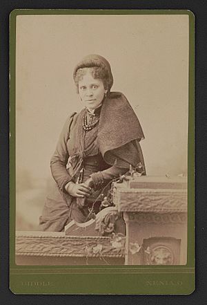 Hallie Quinn Brown, educator and activist, cape draped on shoulder and wearing gloves) - Biddle, Xenia, O LCCN2016645944