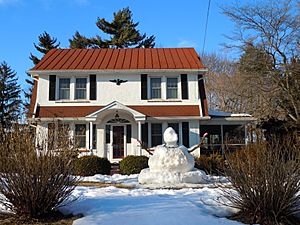 House and snowman in Lionville